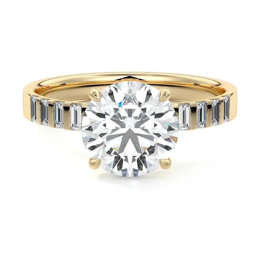 Round cut engagement ring with emerald cut side stones in 18K yellow gold by Nura Lab