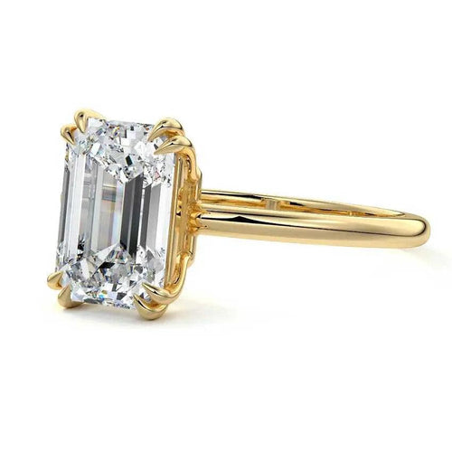 emerald cut solitaire engagement ring yellow gold New Zealand