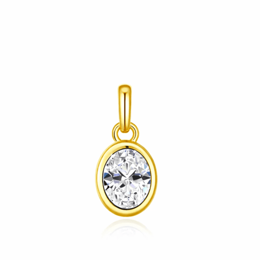 Gold pendant with a clear gemstone on a white background