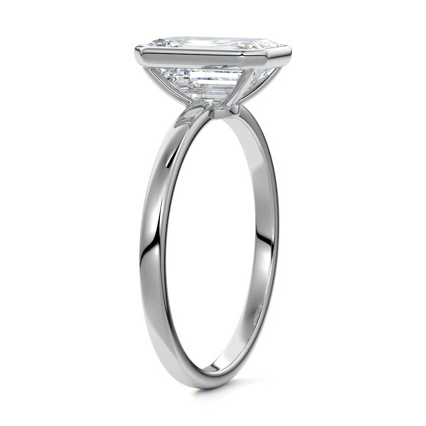 Bezel set emerald cut engagement ring in white gold with lab-grown diamond