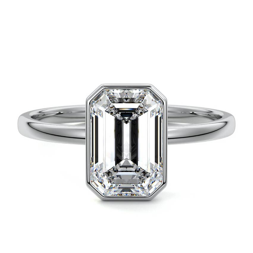 Bezel set emerald cut engagement ring in white gold with lab-grown diamond