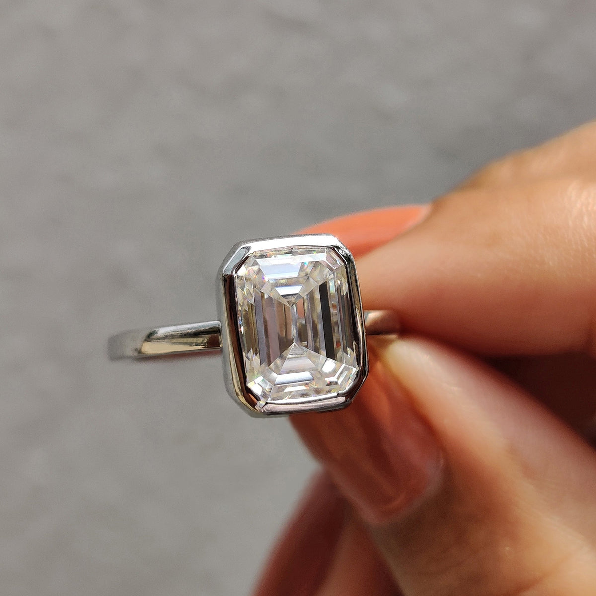 Rosamund Anne - Emerald Engagement Ring With Bezel Setting
