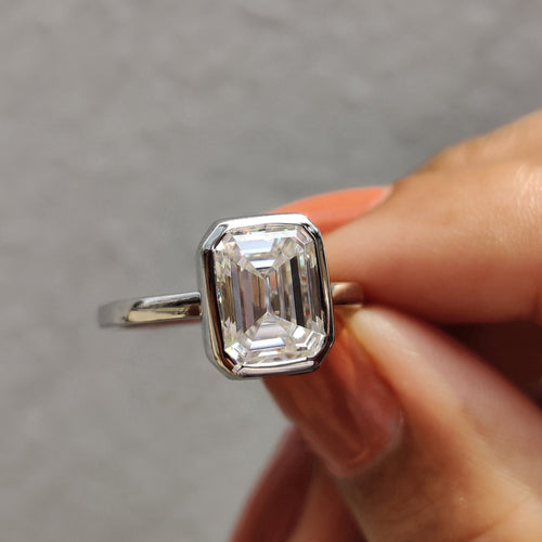 Rosamund Anne - Emerald Engagement Ring With Bezel Setting