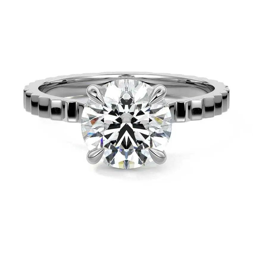 Round fluted solitaire engagement ring in platinum with lab-grown diamond