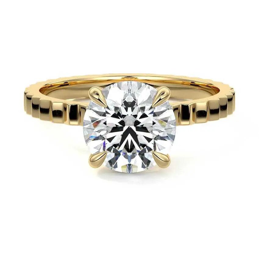 Round fluted solitaire engagement ring in 18K gold with lab-grown diamond