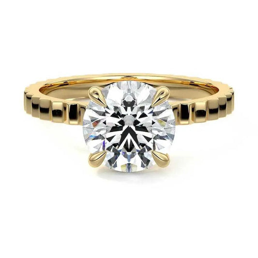 Round fluted solitaire engagement ring in 18K gold with lab-grown diamond