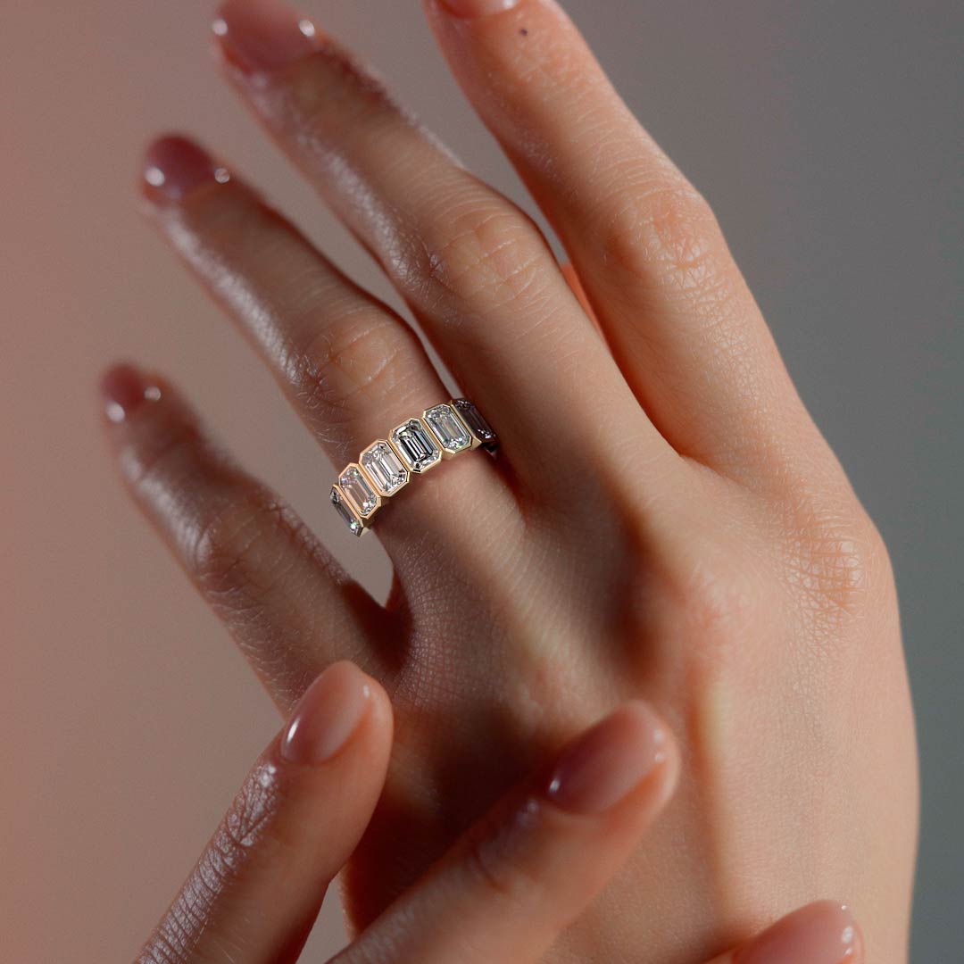 Nura - Half Eternity Bezel Emerald Cut Wedding Band