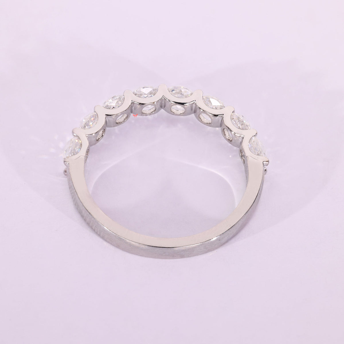 White gold wedding band delivers sleek elegance with a polished, bright finish.