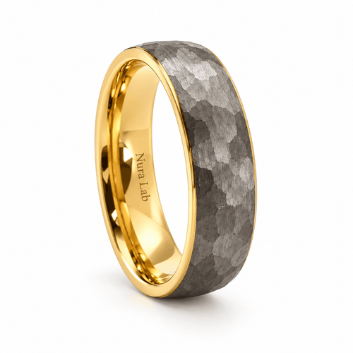 Jay hammered tungsten wedding ring with gold interior on white