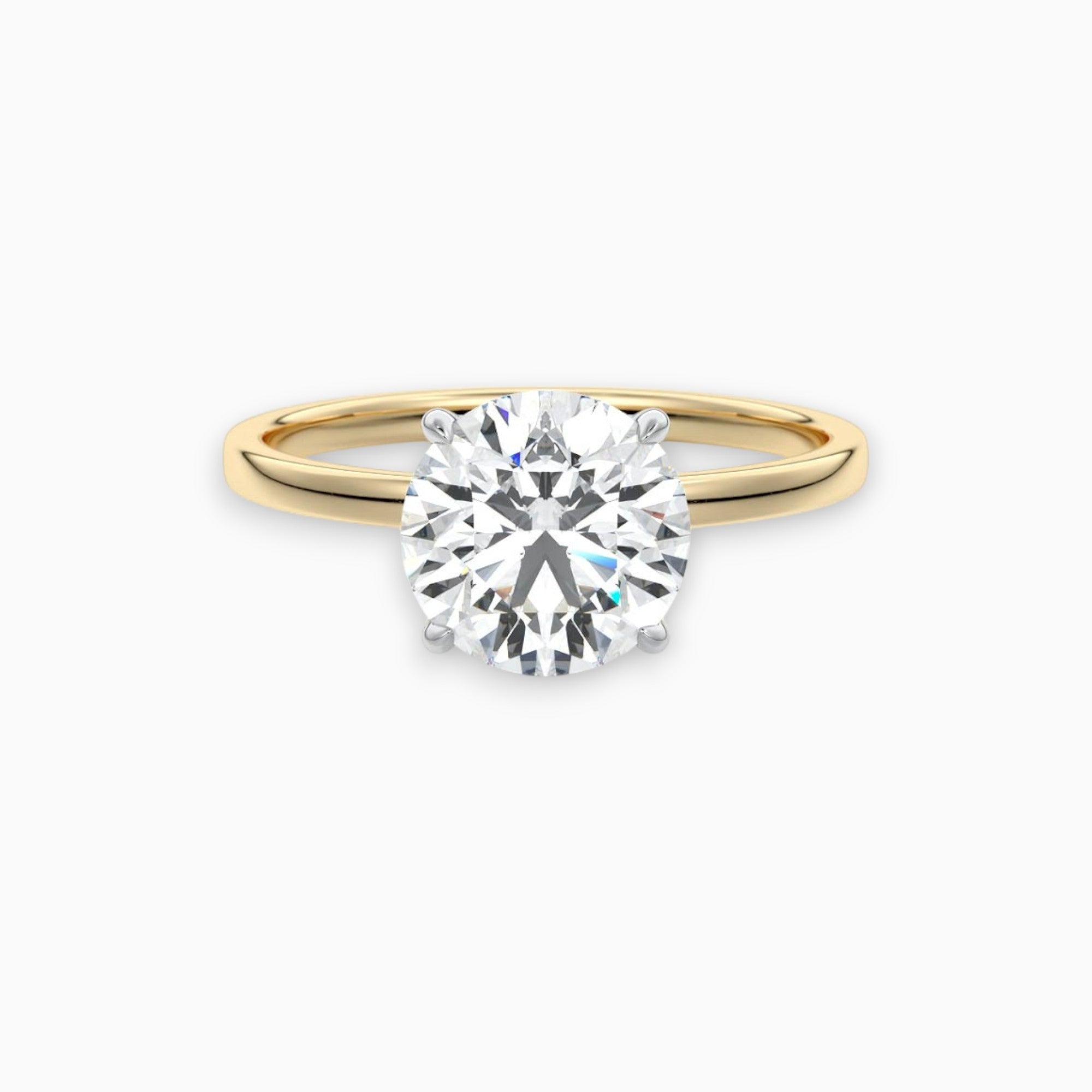 solitaire round cut engagement ring in white gold New Zealand