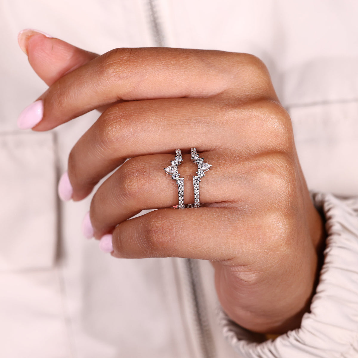 An enhancer wedding band adds sparkle to your engagement ring.
