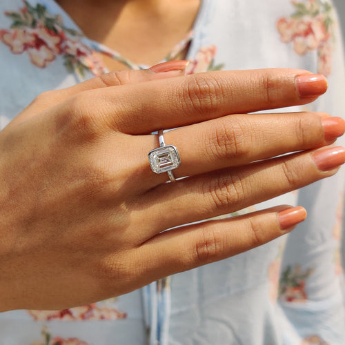 Rosamund Anne - Emerald Engagement Ring With Bezel Setting