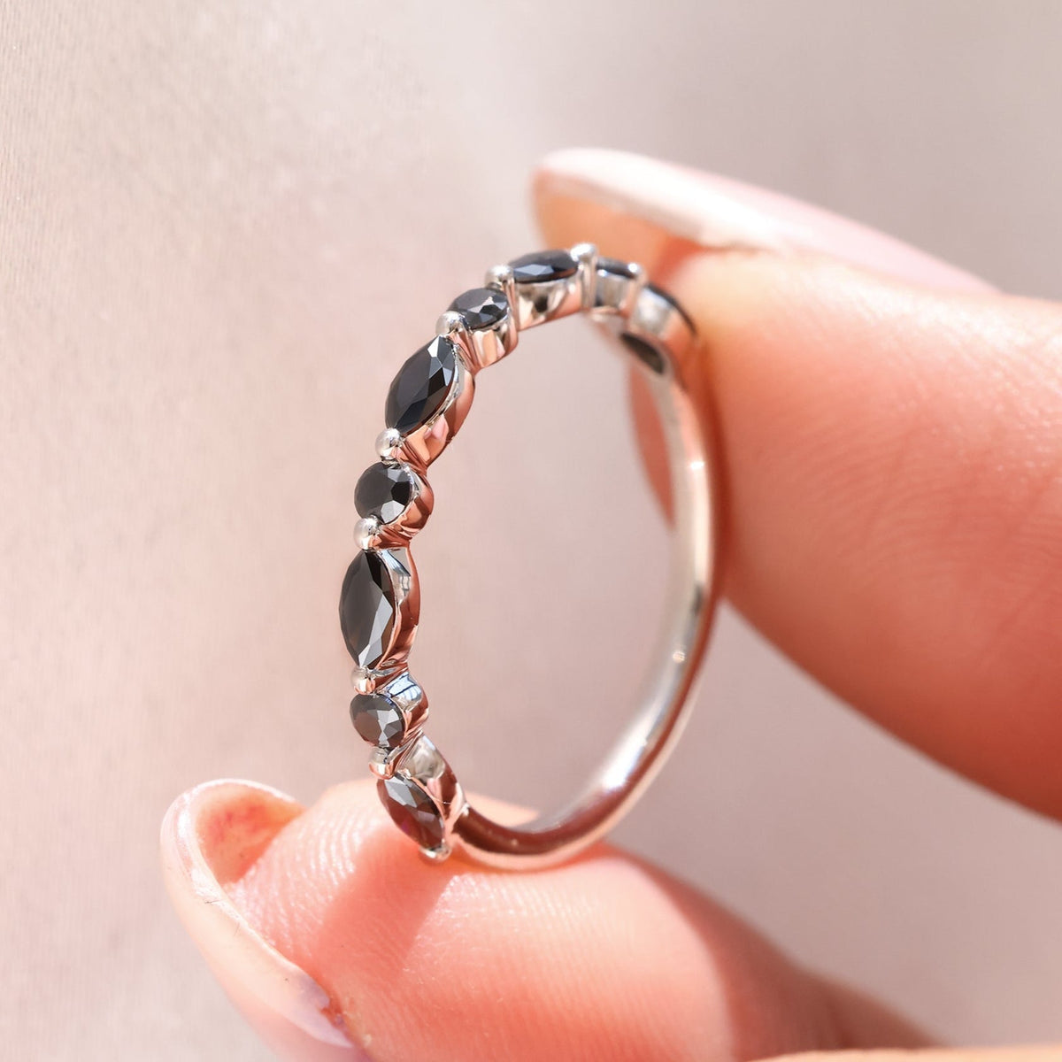 Marquise and round wedding band with a classic design.