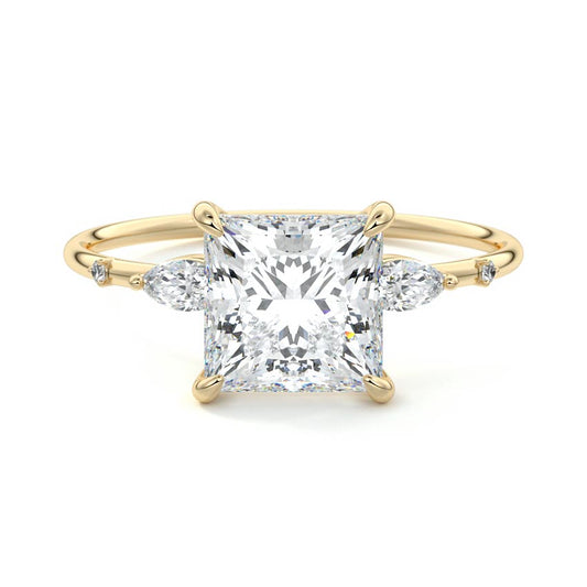 Nikki princess side stone lab grown diamond engagement ring in yellow gold by Nura Lab New Zealand