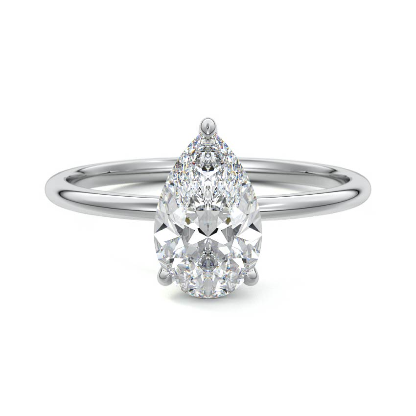 A solitaire pear shape moissanite engagement ring in yellow, rose, white gold and platinum, handcrafted by Nura Lab in New Zealand.