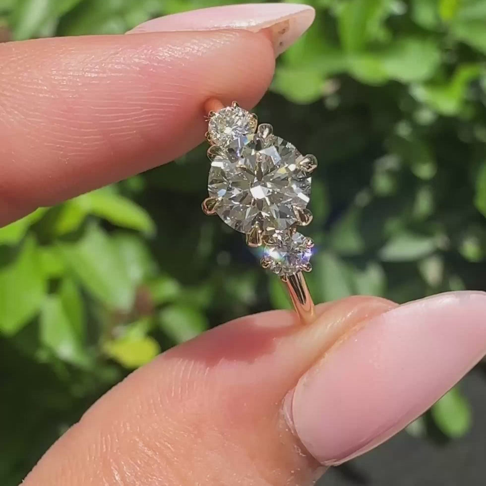 Solene Dawn - Round Cut Diamond Ring In 3 Stone Style - product video