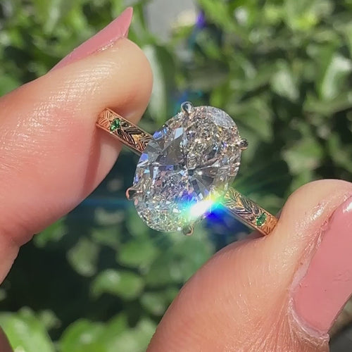 Rosalie Fern - Oval Cut Art Deco Diamond Ring with Two Emerald Side Gemstones - product video