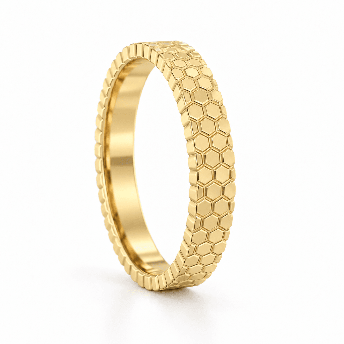 Raphana honeycomb gold wedding band on white