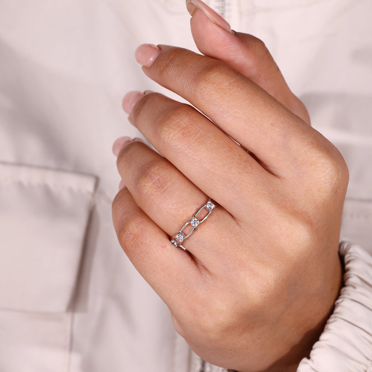 Handmade round moissanite wedding band.
