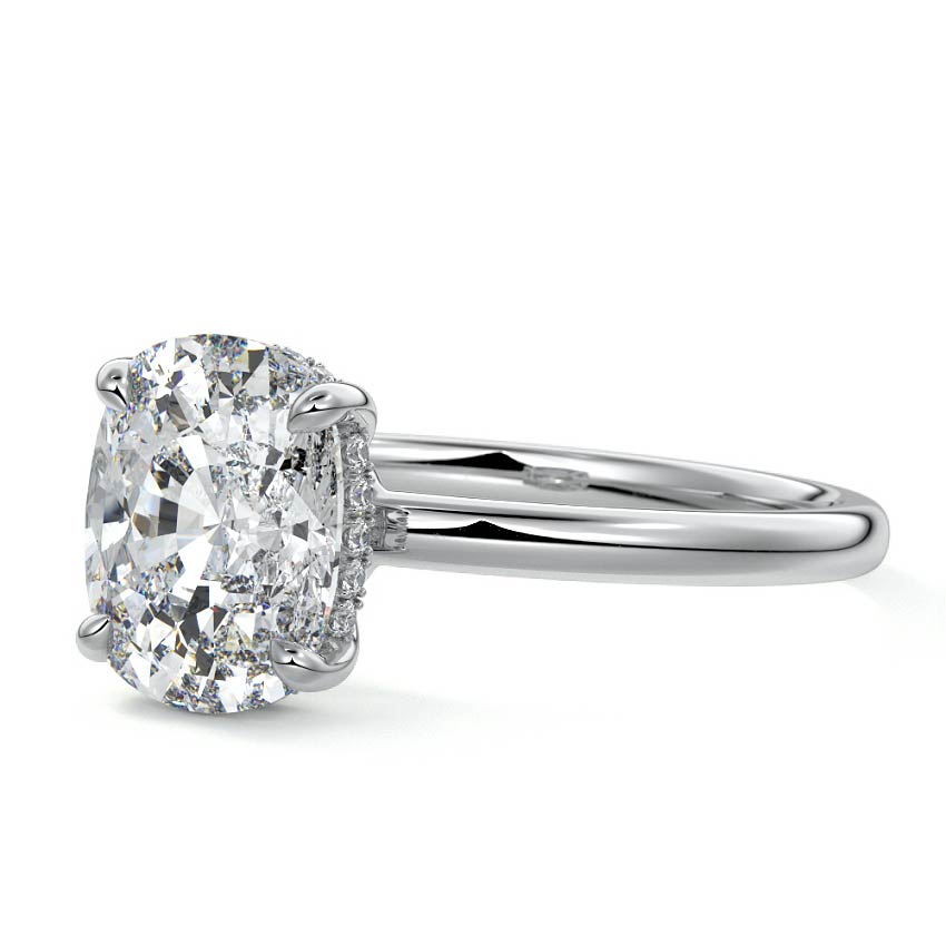 Oval moissanite solitaire ring on platinum plain band, side profile