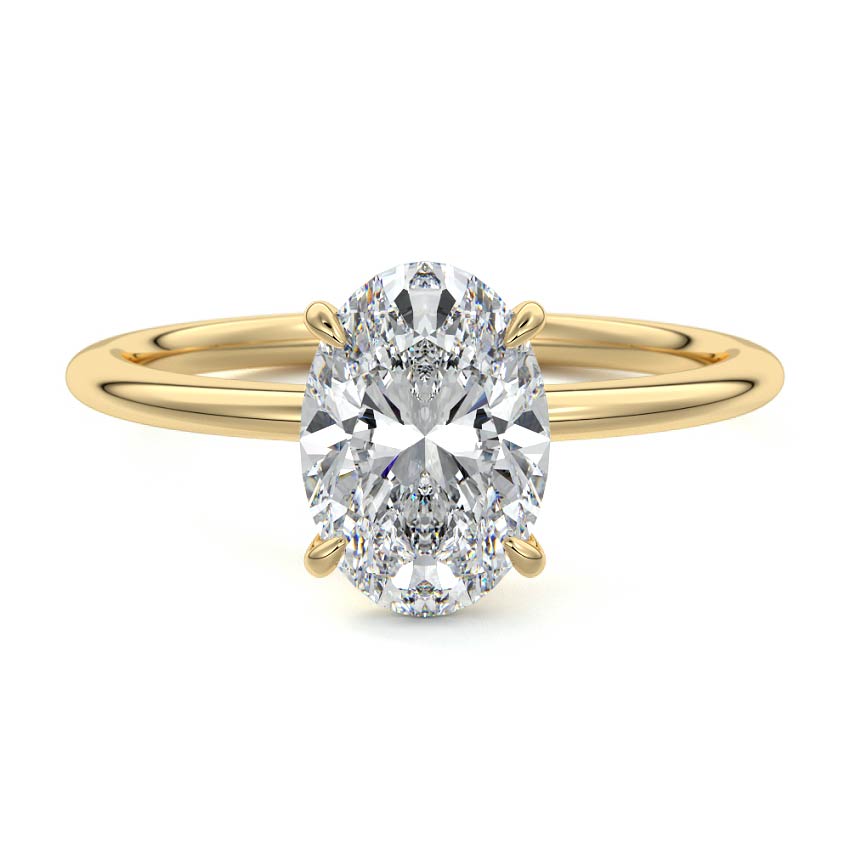Gold ring with a large oval diamond on a white background