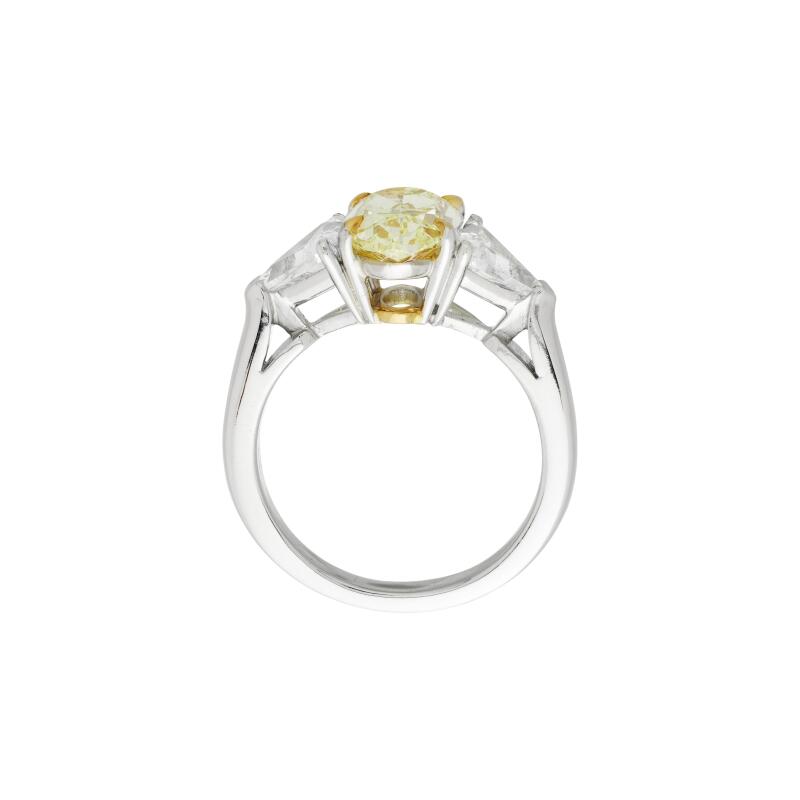 Three stone oval cut yellow diamond trilogy engagement ring in 18K gold