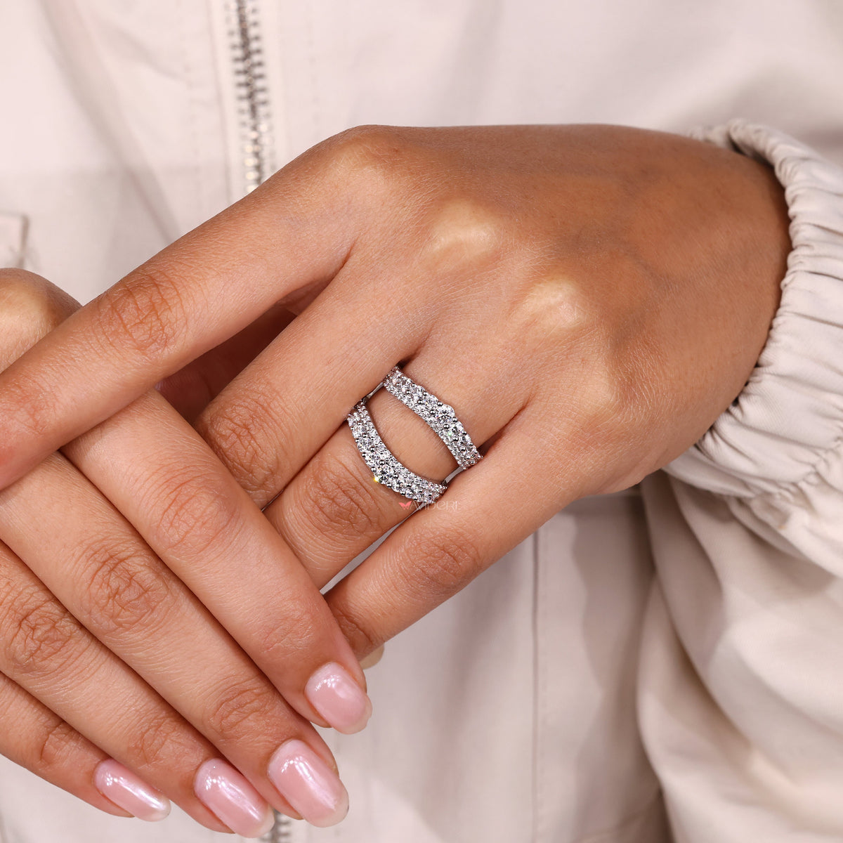 Round cut moissanite band curved wrap style.
